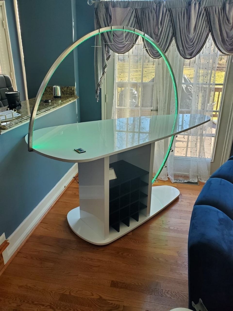 Large specialty glass fixture prepared for careful handling